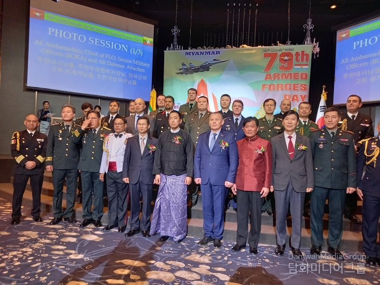 Amb. U Thant Sin of Myanmar to Korea (6th from the left, front row) take a group photo with foreign ambassadors and other guests at the gala event to celebrate the 79th Anniversary of Myanmar Armed Forces Day held at the Riverside Hotel in Seoul on March 27.