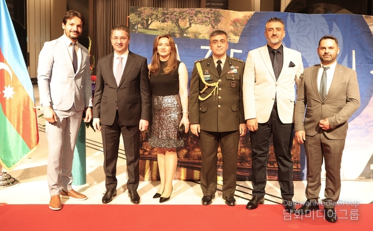 Ambassador Ramin Hasanov of Azerbaijan and his spouse Mrs. Nurlana Hasanova (second and third from the left) pose with staff members of the Embassy of Azerbaijan in Seoul.