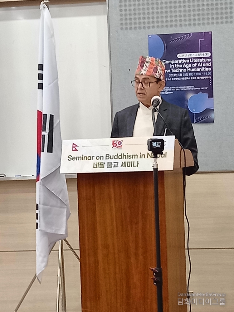 Pushpa Raj Bhattarar, Deputy Chief of Mission (Minister Counsellor) of the Embassy of Nepal in Seoul delivers welcome remarks at Dongguk University in Seoul on May 24, 2024.