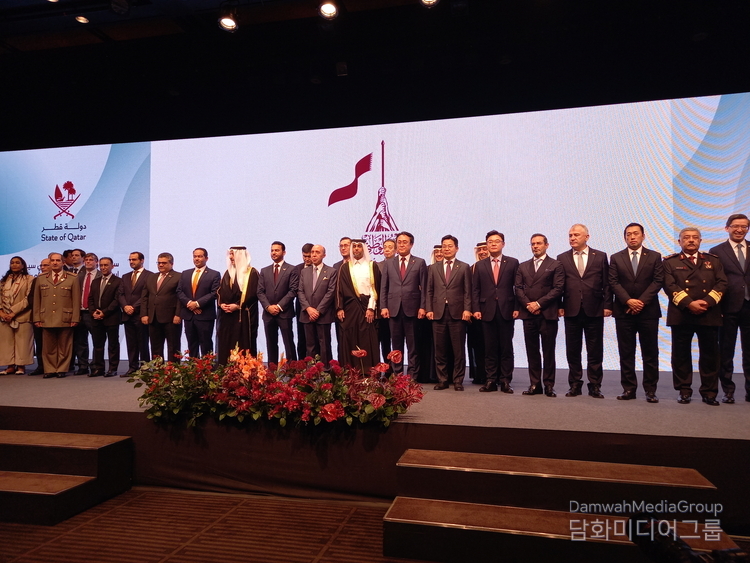 Qatar Ambassador to Korea Khalid Ebrahim al-Hamar takes a group photo with foreign ambassadors and a Korean guest at a reception held at the Shilla Hotel in Seoul on Dec. 16, 2024.