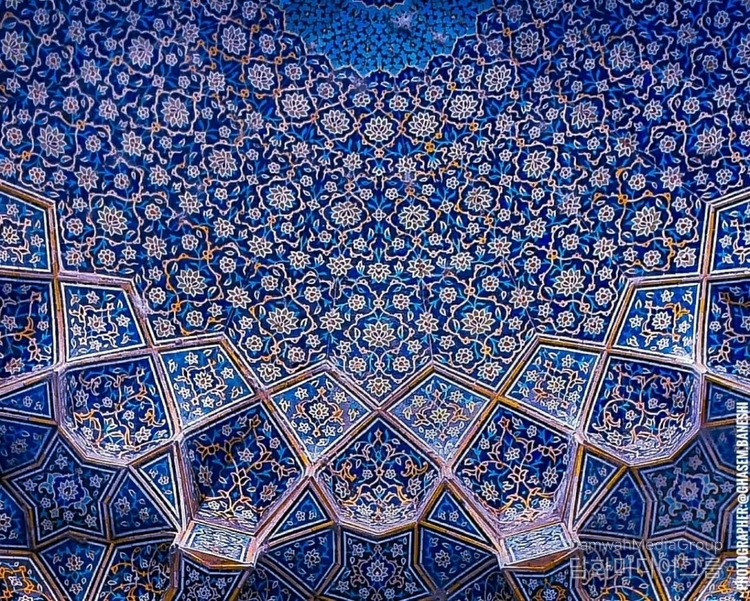 Iranian tile art: The entrance to the Imam Mosque of Isfahan. The color blue in Iranian culture symbolizes the sky and purity.